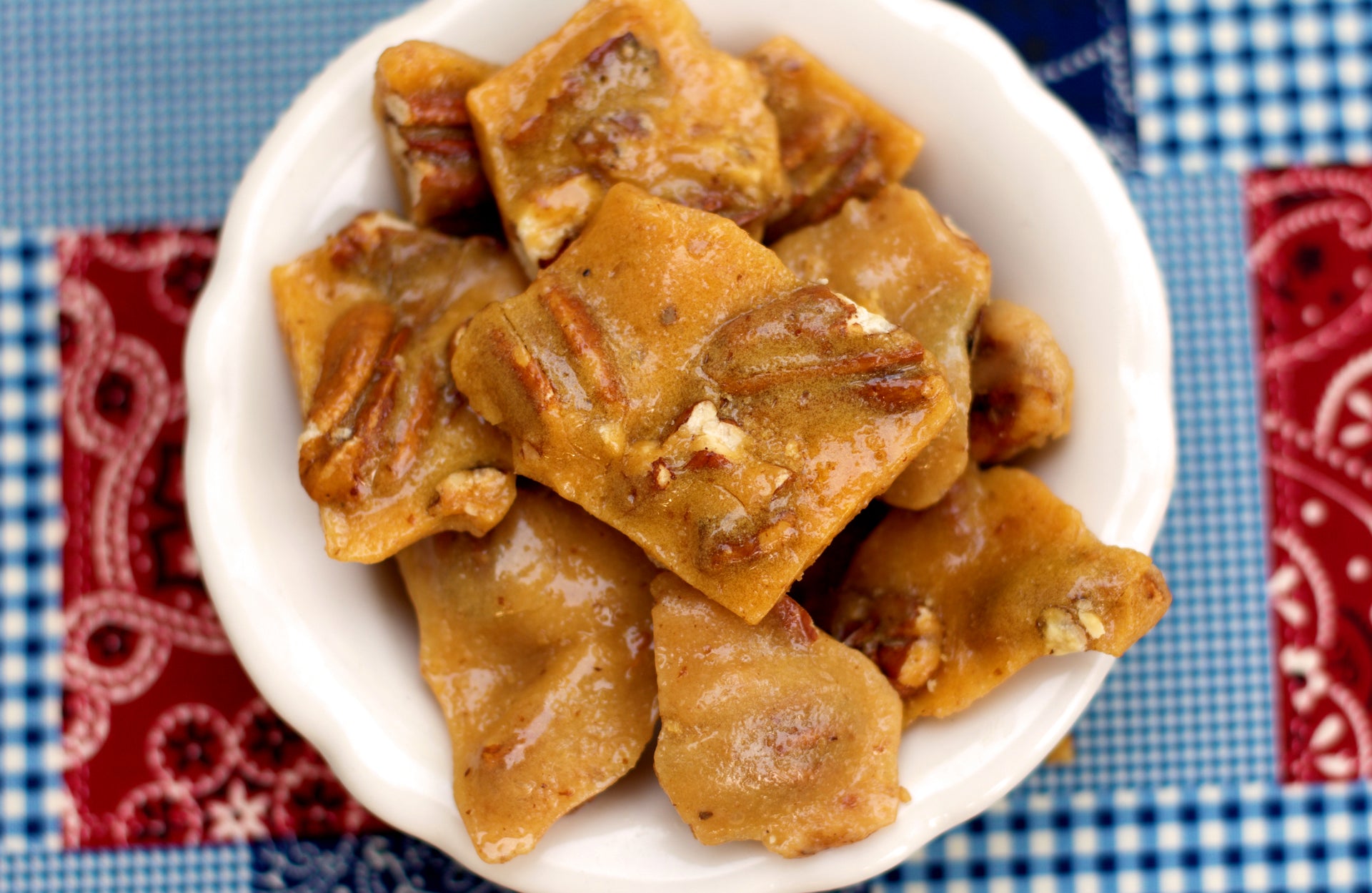 Our pecan brittle is sold in 8 ounce bags. They're made with delicious golden pecan halves and covered with a buttery brittle!