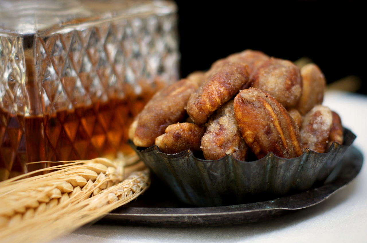 Our Texas Whiskey Pecans are coated in a brown sugar glaze with a hint of bourbon. Sold in 1 pound bags or 10 ounce gift tins. 