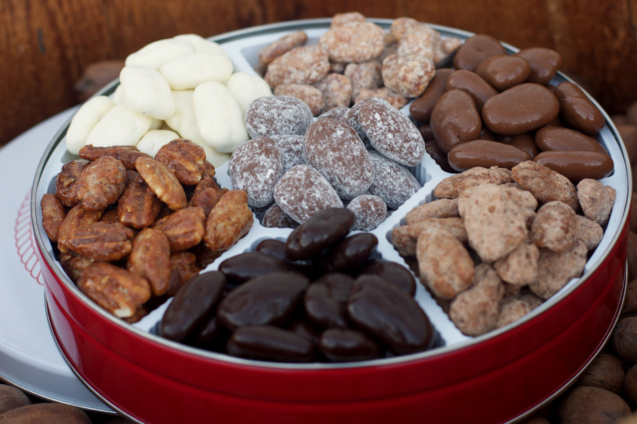 Our 7 Way Pecans Gift Tin includes seven different flavors of pecans. This makes for a great Christmas Gift or Corporate business gift!