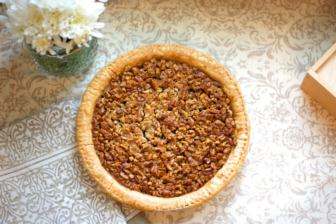 Made-from-scratch Southern Pecan Pie. This pie is shipped in a wooden box to ensure safe delivery. Enjoy for yourself or ship out as a gift! Perfect for Thanksgiving or Christmas celebrations.